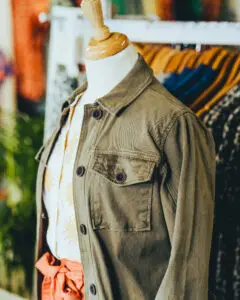 Olive green jacket on store mannequin in Brakeburn, Poole