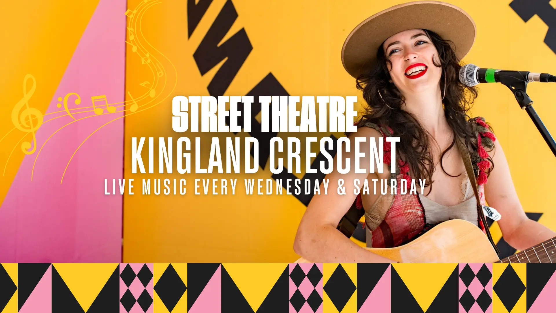 A woman wearing a hat and a plaid shirt plays an acoustic guitar and sings into a microphone. The background features bold yellow, pink, and black geometric patterns. Text on the image reads: 'STREET THEATRE KINGLAND CRESCENT LIVE MUSIC EVERY WEDNESDAY & SATURDAY.'